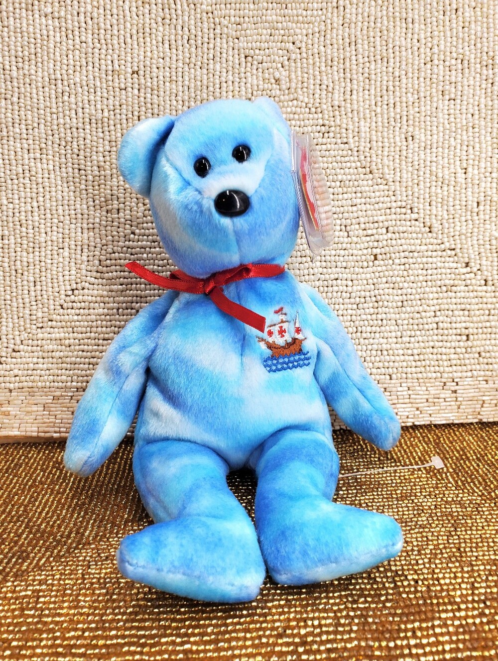 "Santa Maria," a tie-dyed blue bear  Ty Beanie Babies 2004 collection (NAV1)